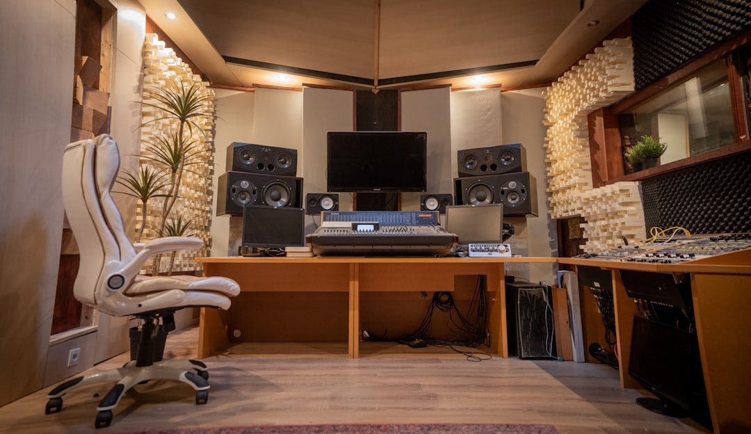 Live studio broadcasting control room with multiple monitors and video switcher